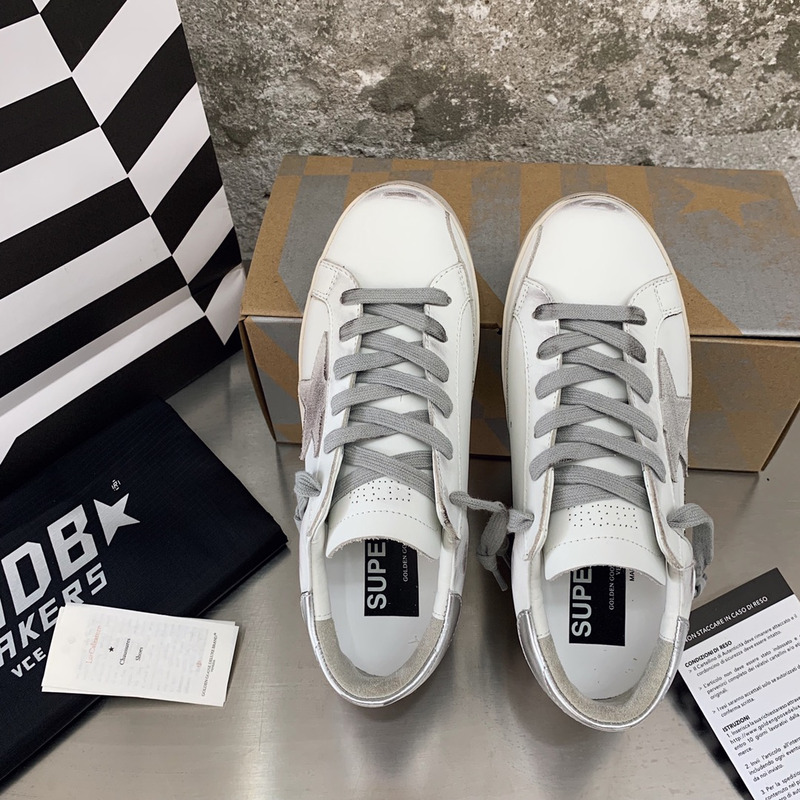 golden goose men’s S*per-star sneakers with suede star and sliver heel tab