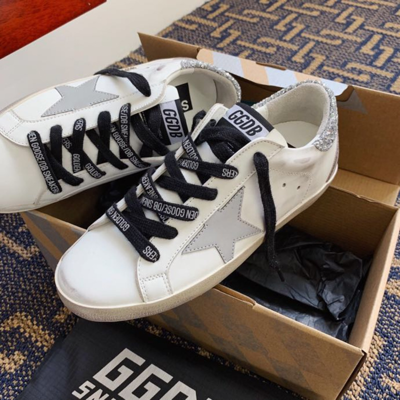 golden goose men’s S*per-star sneakers with suede star and sliver glitterheel tab