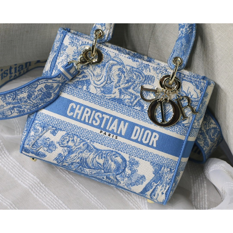 D*or lady d-lite bag toile de jouy reverse embroidery in fluorescent blue
