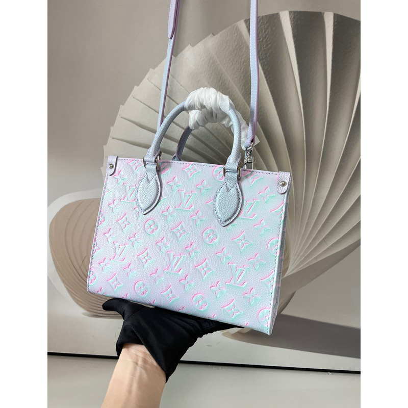 l**is V*t*n green, and blue summer stardust onthego pm silver hardware