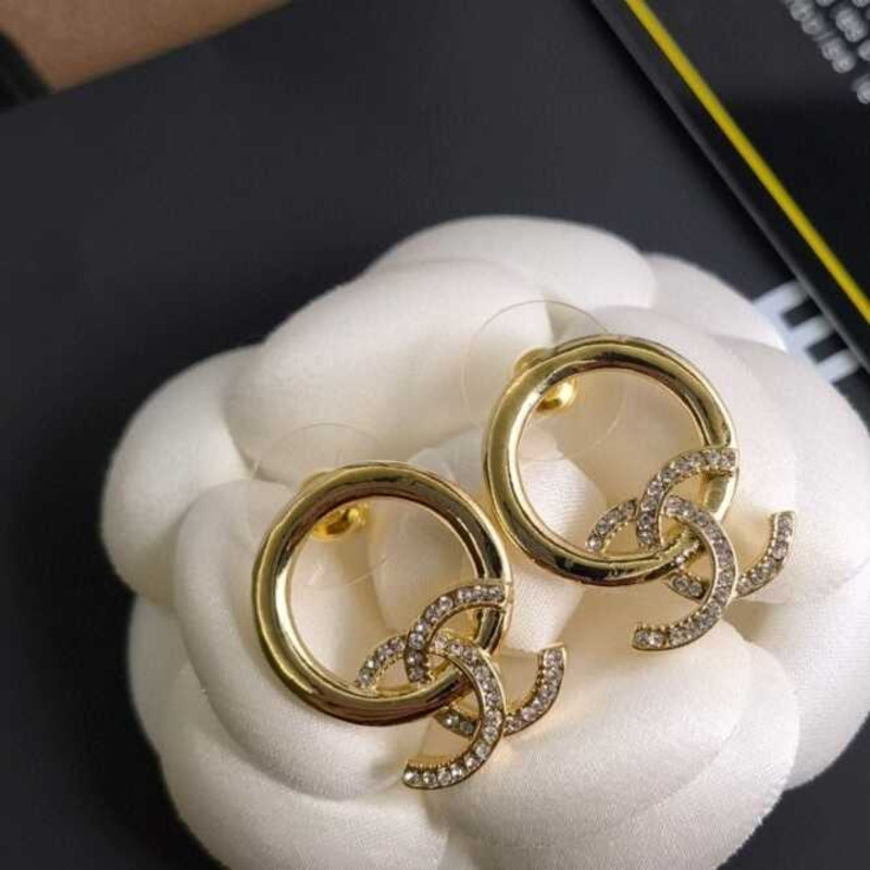 Ch*el gold earrings