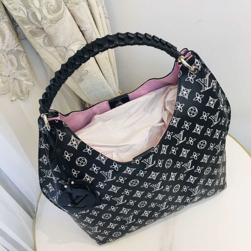 l**is V*t*n m21299 carmel mahina leather bag