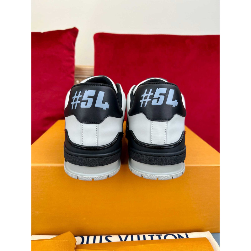 l**is V*t*n trainer sneakers black and white