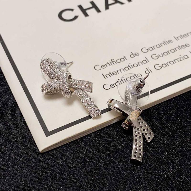 ch*el bow tie sparkling Di*m*nd earrings