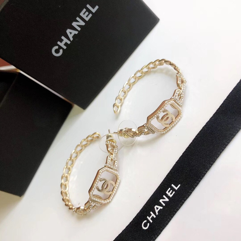 ch*el Di*m*nd metal earrings