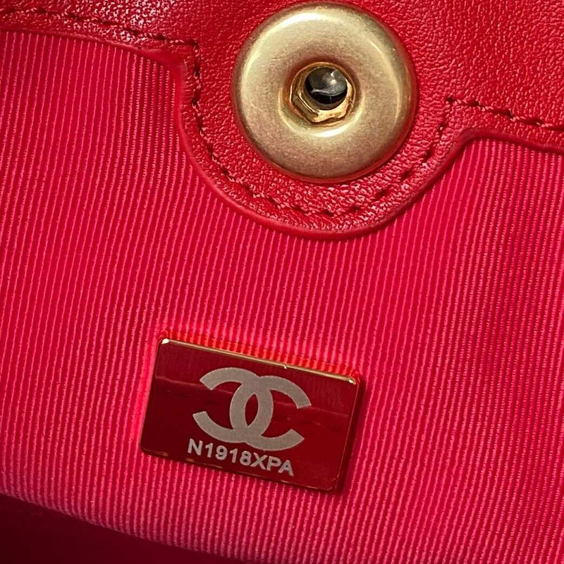 Ch*el small backpack calfskin & gold-tone metal red
