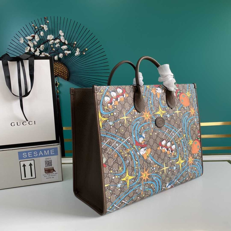 G*u*i x disney limited tote beige