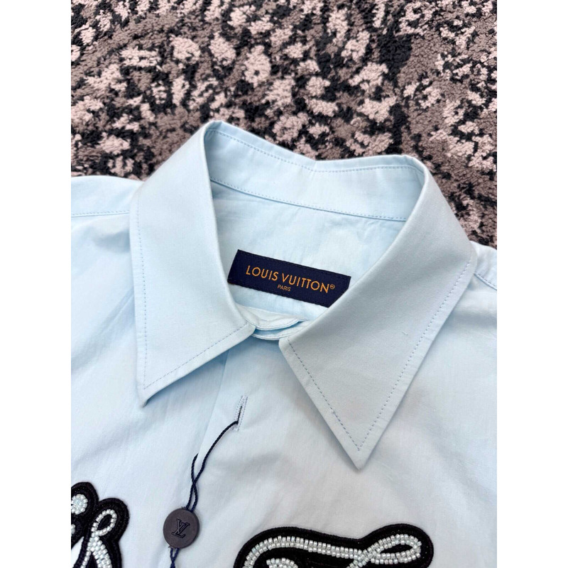 l**is V*t*n embroidered cotton shirt sky blue