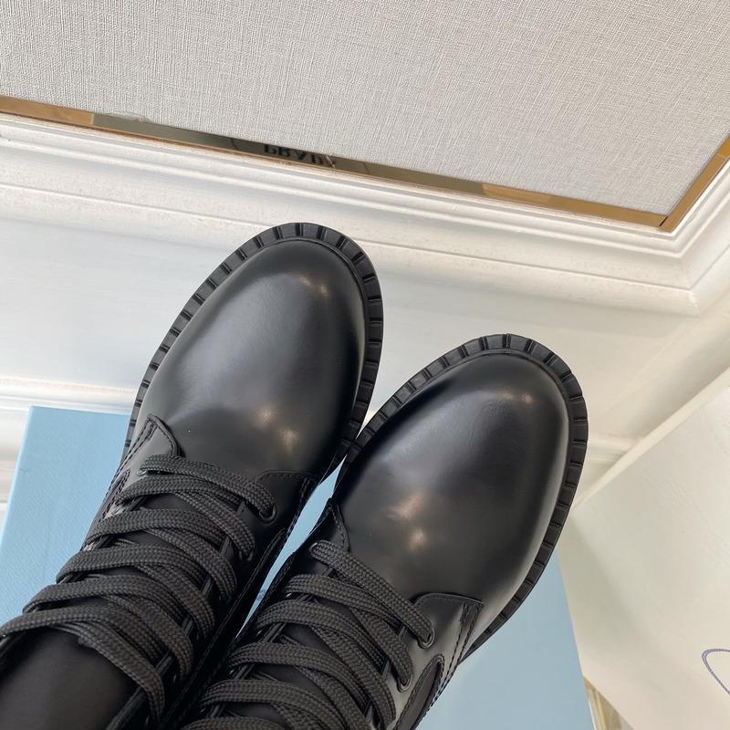 Pra*a brushed-leather and re-nylon boots black