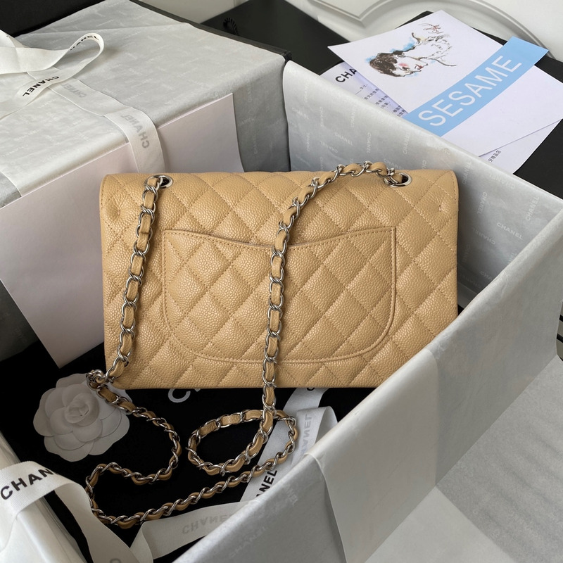 Ch*el medium caviar silver classic flap bag beige
