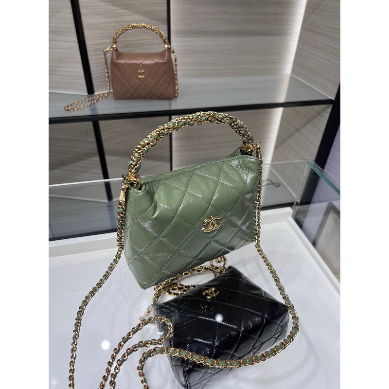 Ch*el rotating handle chain lunch box bag oil wax leather in green