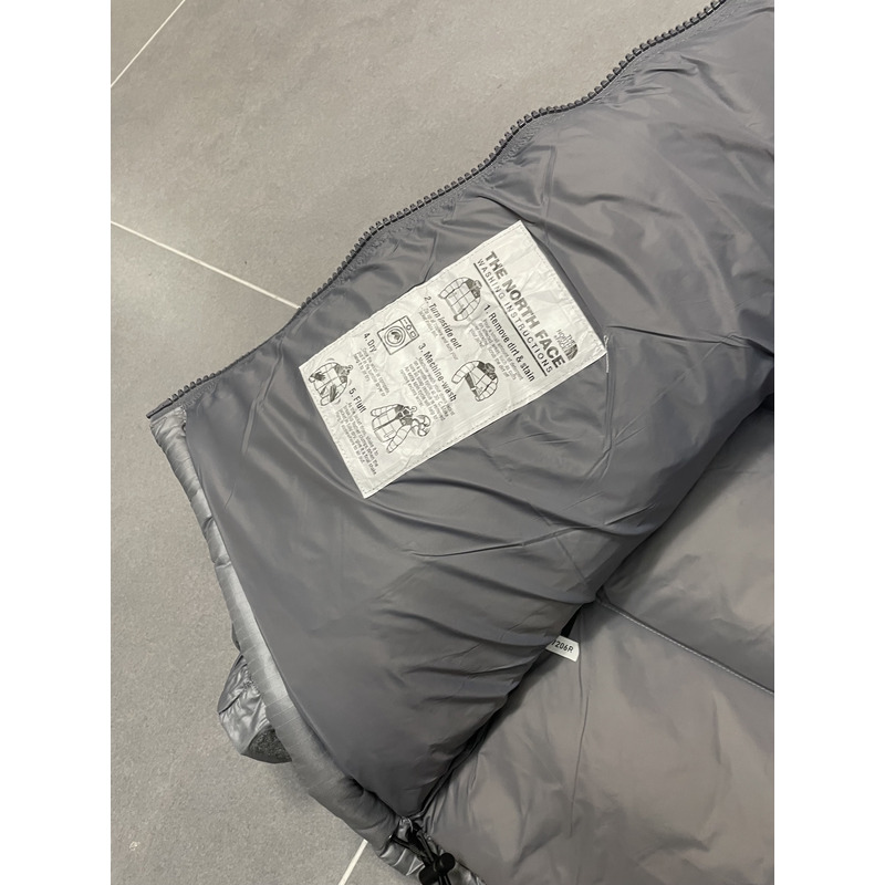 the n0*h F**e nuptse down jacket sliver