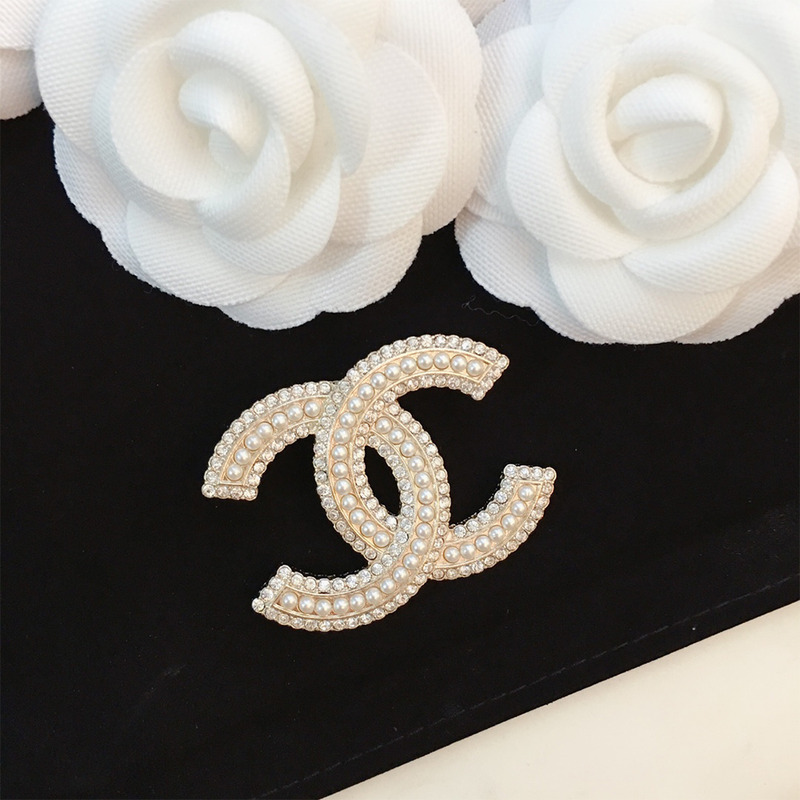 Ch*el brooch