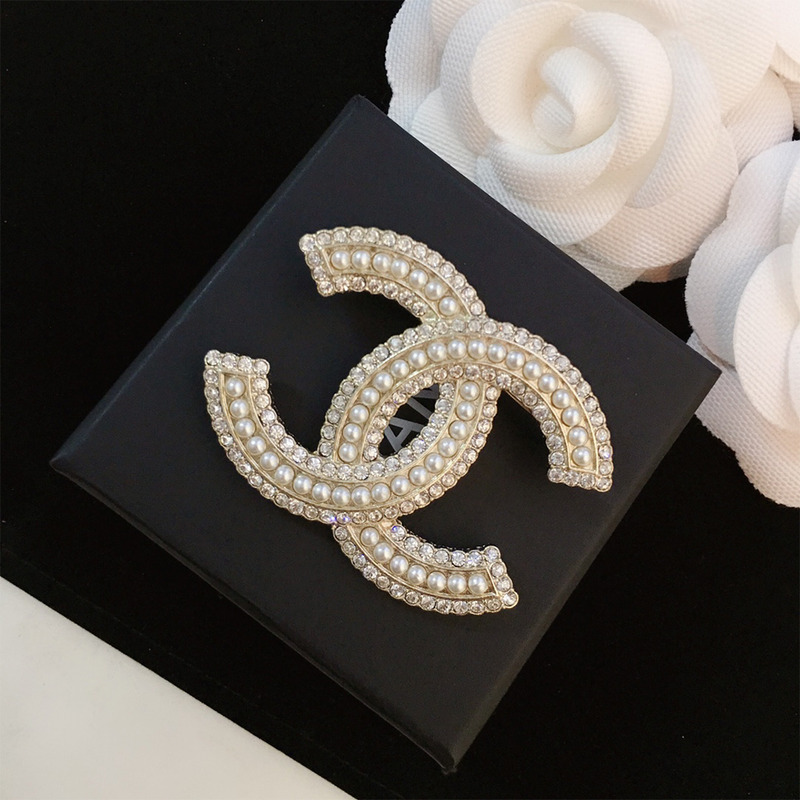 Ch*el brooch